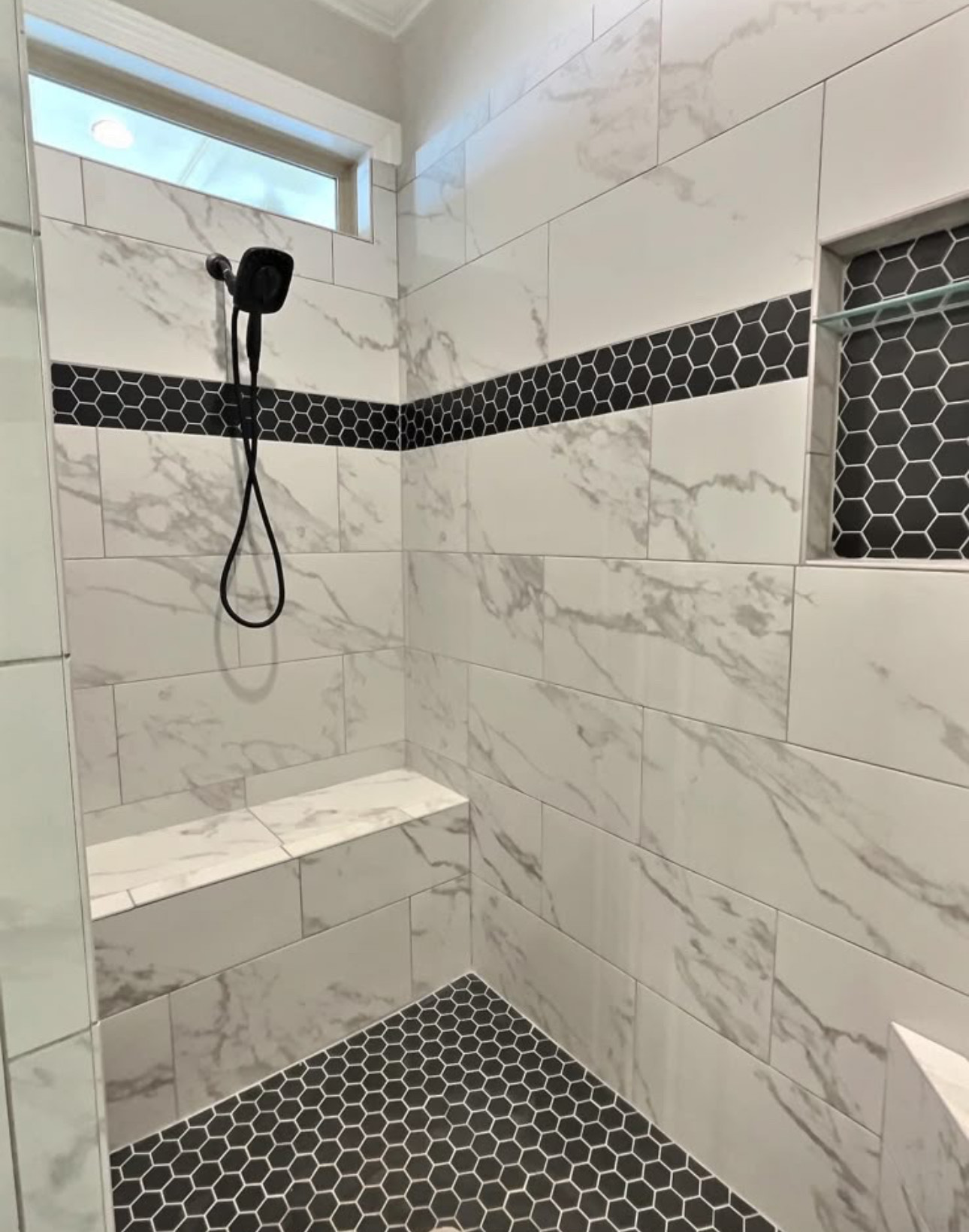 Intricate mosaic tile detail in a shower
